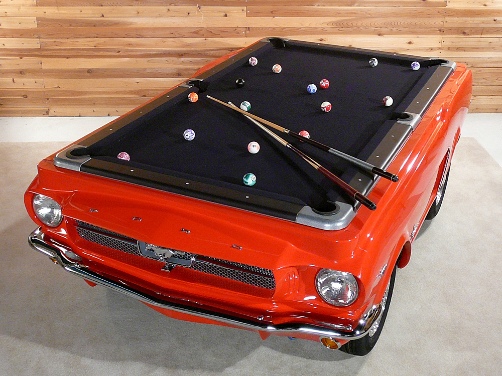 The table is a great addition to the classic car collector game room